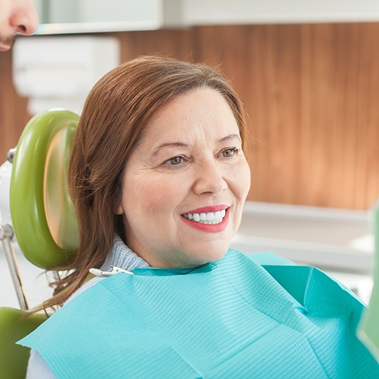 Woman smiling at the dentist