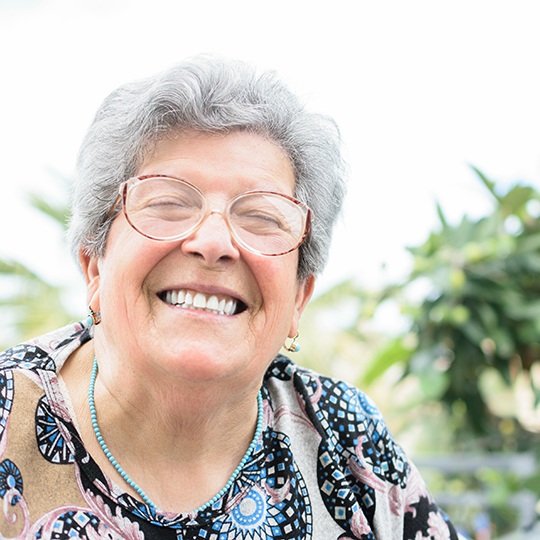 Woman smiling outside