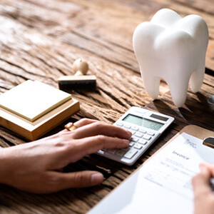 patient in dallas looking at their dental insurance