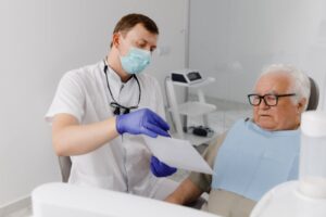 older patient having a dental implant consultation